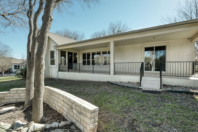 113 Yaupon Ln, Georgetown, TX 78633 - back of property with a porch and stucco siding