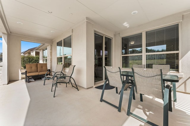 view of patio featuring outdoor dining area and outdoor lounge area