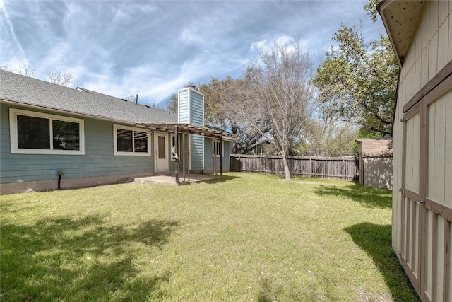 view of yard with fence and a patio area