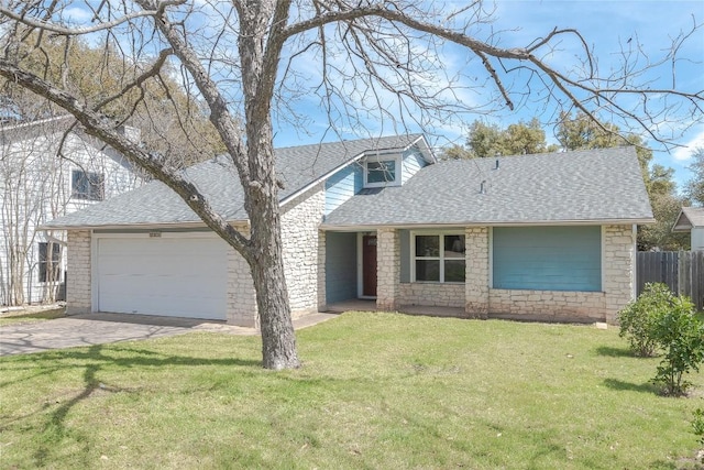 view of front of property with a shingled roof, fence, a front yard, driveway, and an attached garage