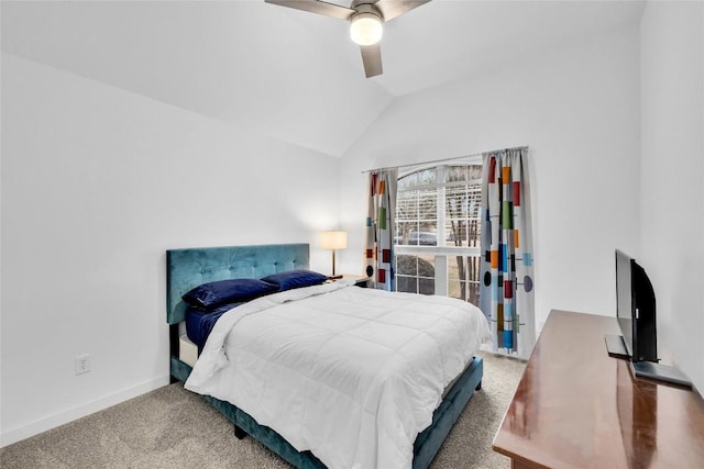 bedroom with baseboards, carpet, ceiling fan, and vaulted ceiling