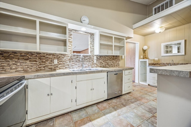 kitchen featuring open shelves, a sink, stainless steel appliances, white cabinets, and backsplash