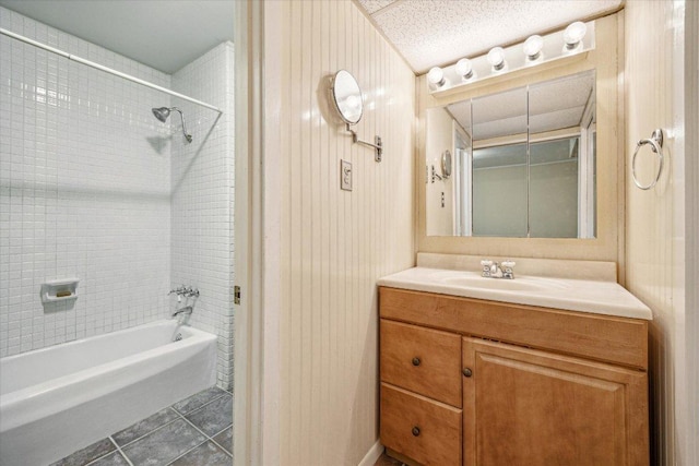 bathroom featuring vanity,  shower combination, wood walls, and tile patterned floors