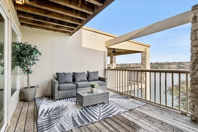 wooden terrace featuring an outdoor hangout area