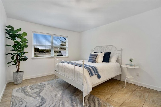 bedroom with baseboards