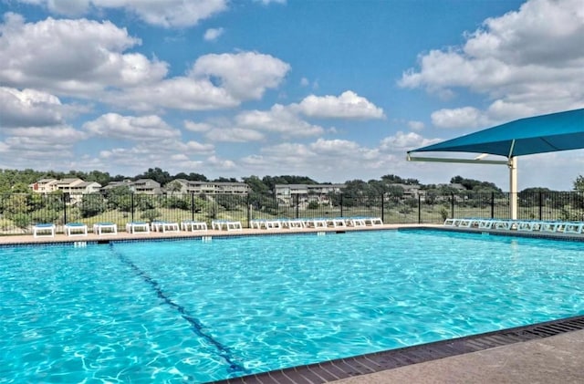 community pool with fence