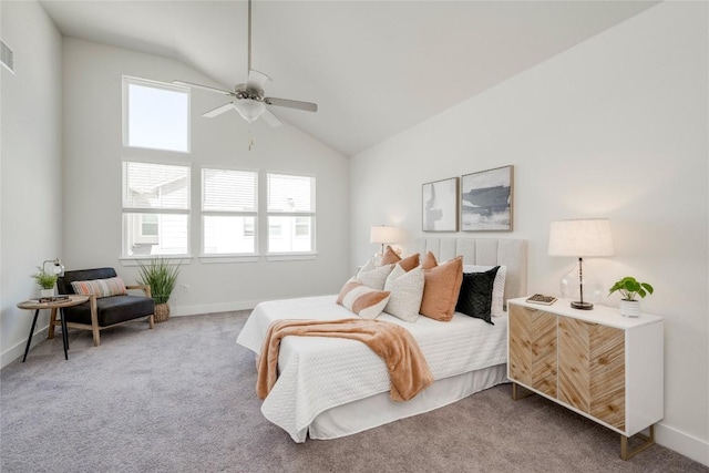 bedroom featuring baseboards, lofted ceiling, a ceiling fan, and carpet flooring