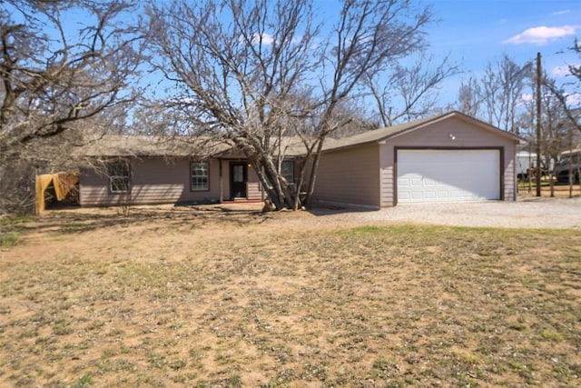 6257 River Oaks Dr, Kingsland, TX 78639 - ranch-style house featuring driveway and a garage