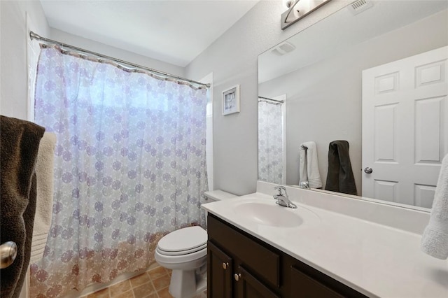 bathroom featuring vanity, toilet, a shower with curtain, and visible vents