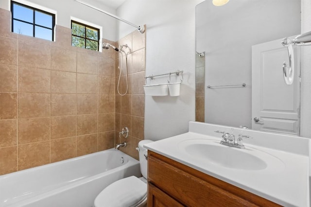 full bath featuring vanity,  shower combination, and toilet