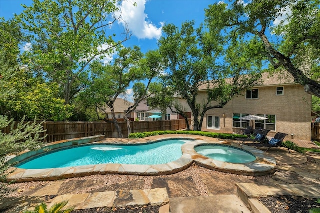 view of swimming pool featuring a fenced in pool, a patio, an in ground hot tub, and fence