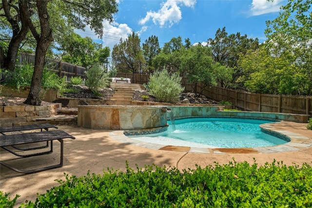 view of pool with a fenced in pool and a fenced backyard