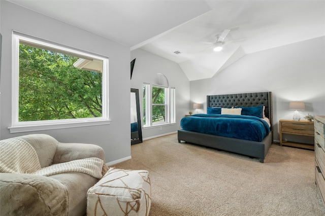 bedroom with visible vents, baseboards, ceiling fan, light colored carpet, and lofted ceiling