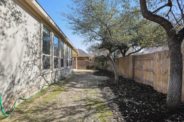 view of yard featuring a fenced backyard