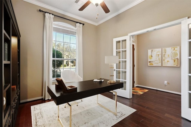 office space with dark wood-type flooring, a ceiling fan, french doors, crown molding, and baseboards