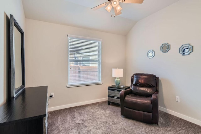 living area featuring lofted ceiling, carpet, baseboards, and ceiling fan