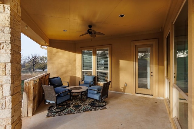 view of patio with a ceiling fan