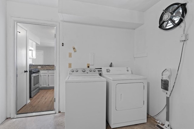 laundry area featuring laundry area and washer and dryer