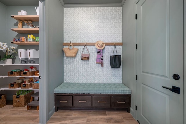 mudroom with light wood-style flooring