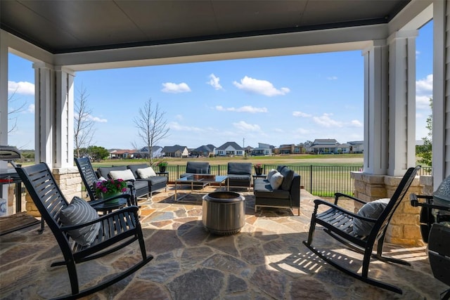 view of patio / terrace with a residential view and an outdoor hangout area