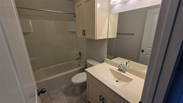 full bathroom featuring tile patterned flooring, toilet, vanity, and bathtub / shower combination