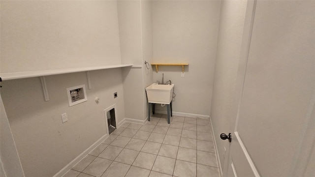 laundry room featuring light tile patterned floors, gas dryer hookup, laundry area, electric dryer hookup, and washer hookup