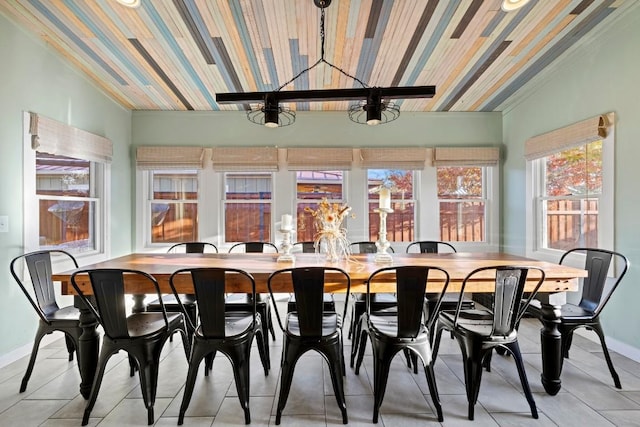 dining room featuring wood ceiling, baseboards, lofted ceiling, and light tile patterned flooring