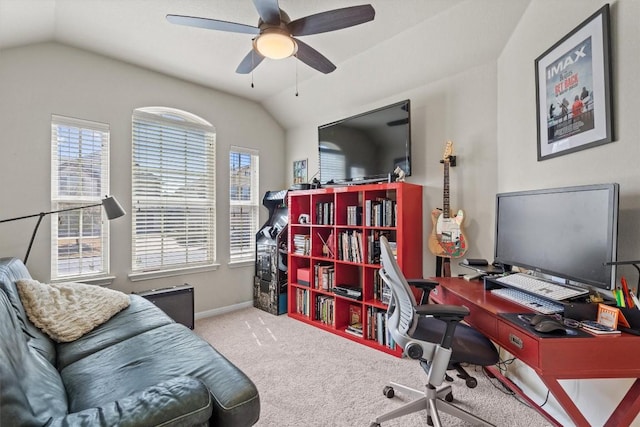 office with lofted ceiling, carpet flooring, a ceiling fan, and baseboards