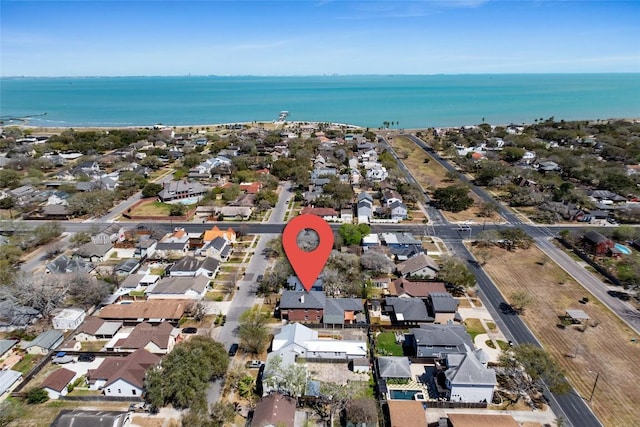 bird's eye view with a water view and a residential view