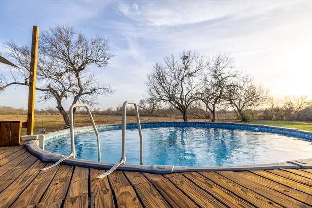 917 County Road 664, Devine, TX 78016 - swimming pool with a deck