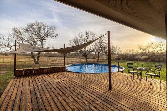 917 County Road 664, Devine, TX 78016 - outdoor pool with a deck and a lawn