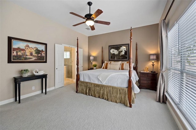 carpeted bedroom with a ceiling fan and baseboards