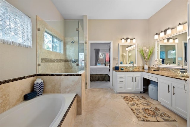ensuite bathroom with a garden tub, vanity, ensuite bath, tile patterned flooring, and tiled shower