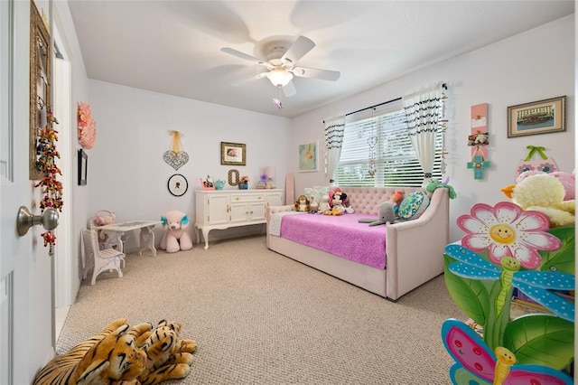 carpeted bedroom with a ceiling fan