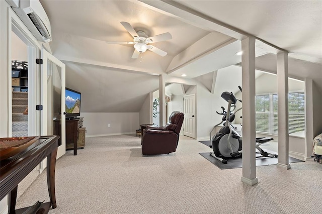 exercise area with lofted ceiling, baseboards, and ceiling fan