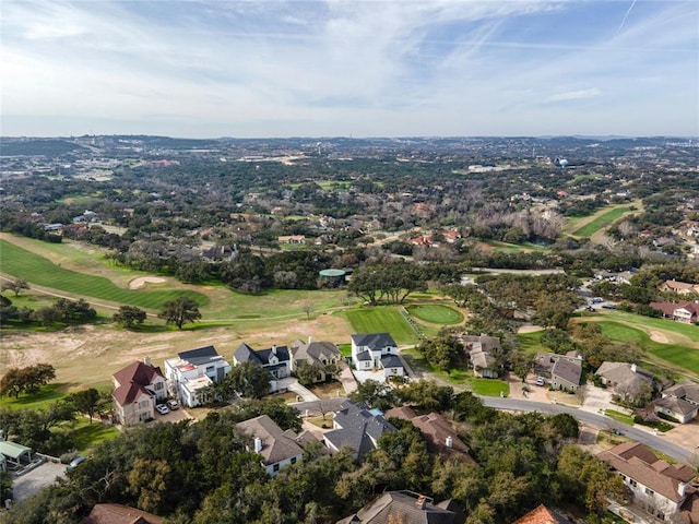 birds eye view of property with a residential view and view of golf course