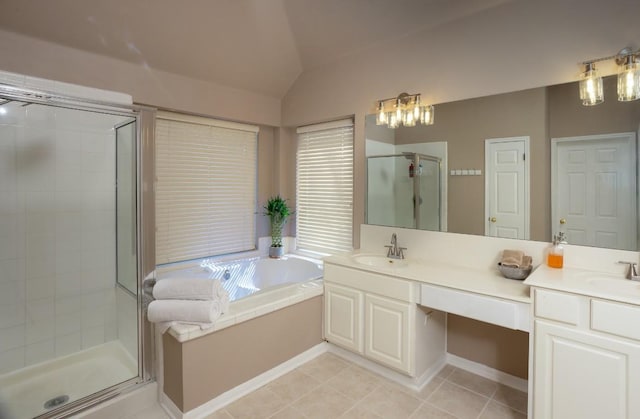 bathroom with a shower stall, a garden tub, double vanity, and a sink