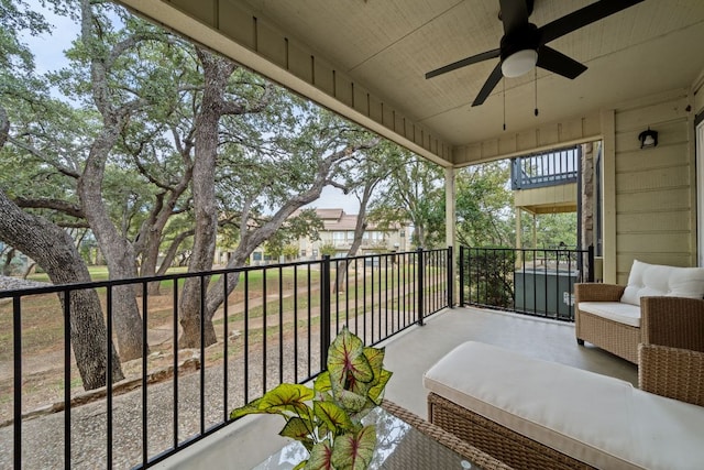 balcony featuring ceiling fan and outdoor lounge area