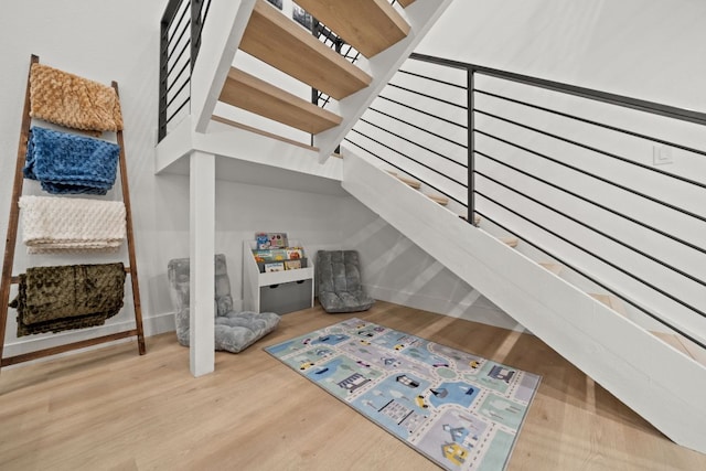 stairs with wood finished floors