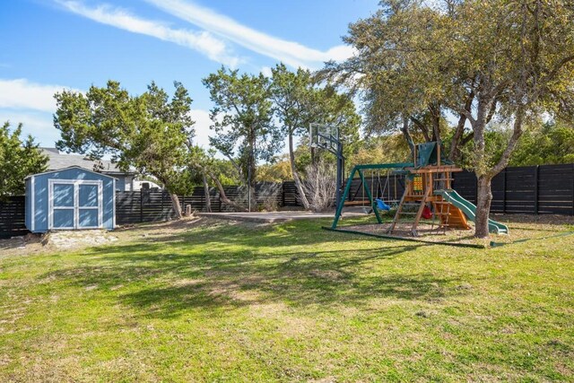 6607 Avenida Ann Dr, Lago Vista, TX 78645 - view of yard featuring a playground