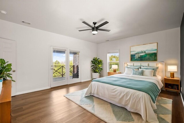6607 Avenida Ann Dr, Lago Vista, TX 78645 - bedroom featuring access to outside, wood finished floors, baseboards, and ceiling fan