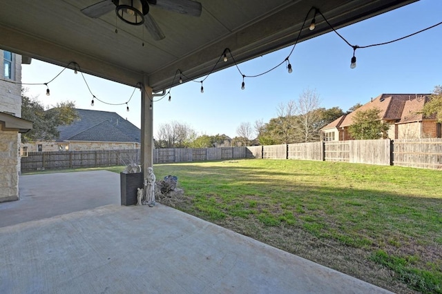 view of patio / terrace with a fenced backyard and ceiling fan