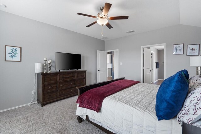 bedroom featuring visible vents, baseboards, lofted ceiling, light carpet, and a ceiling fan