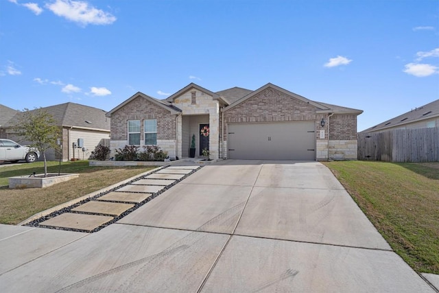 ranch-style home featuring brick siding, a front lawn, fence, concrete driveway, and a garage