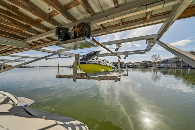 dock area featuring a water view and boat lift