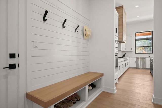 mudroom with light wood-style flooring and recessed lighting