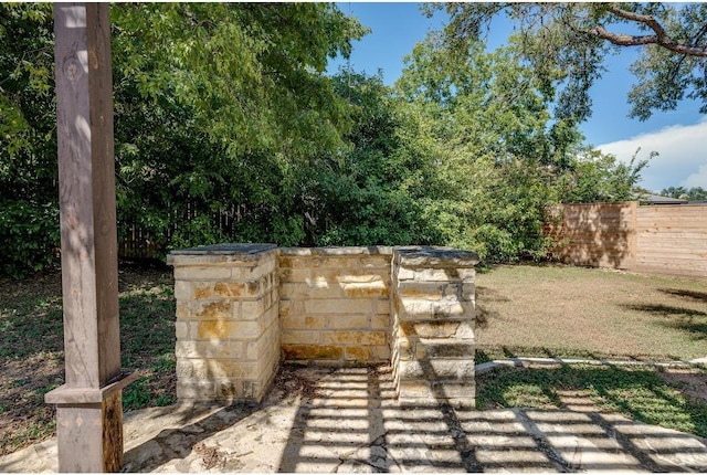 view of gate with fence