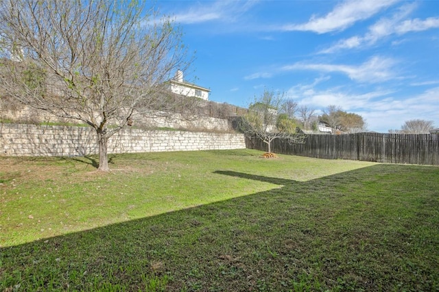 view of yard featuring a fenced backyard