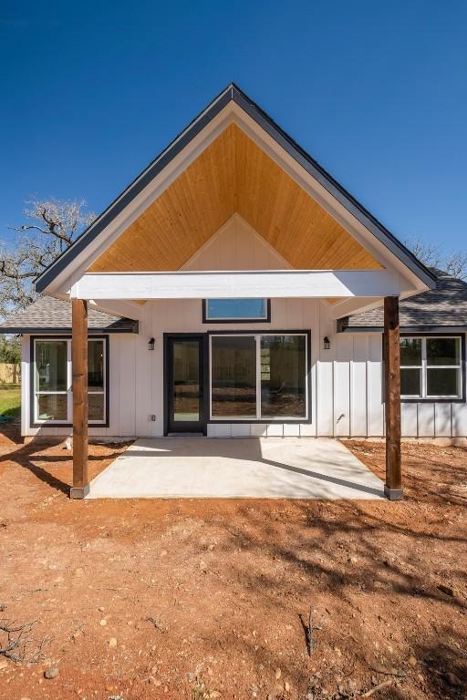 back of property with a patio area