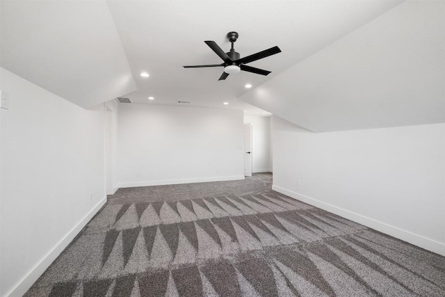 additional living space featuring baseboards, carpet floors, lofted ceiling, recessed lighting, and ceiling fan